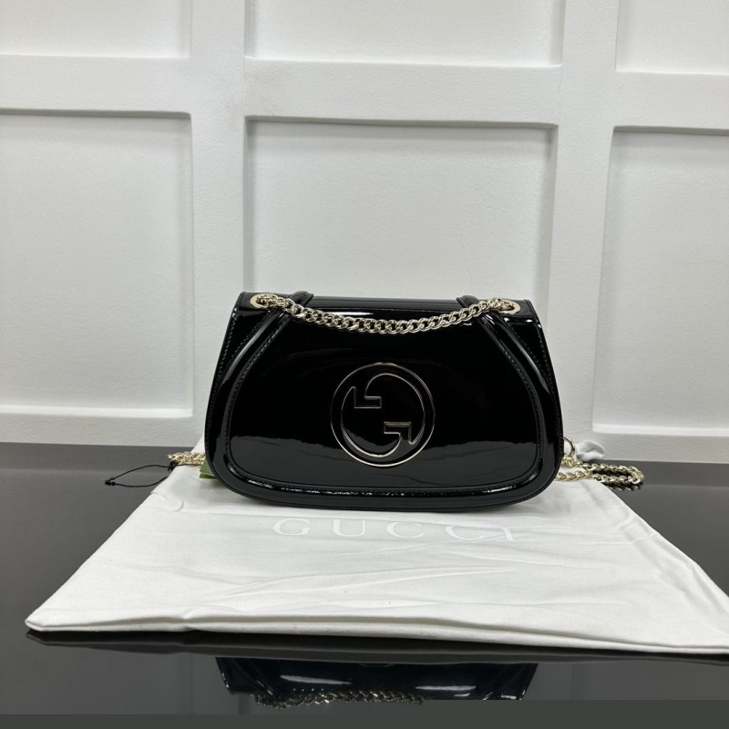 G*u*i top handle bags